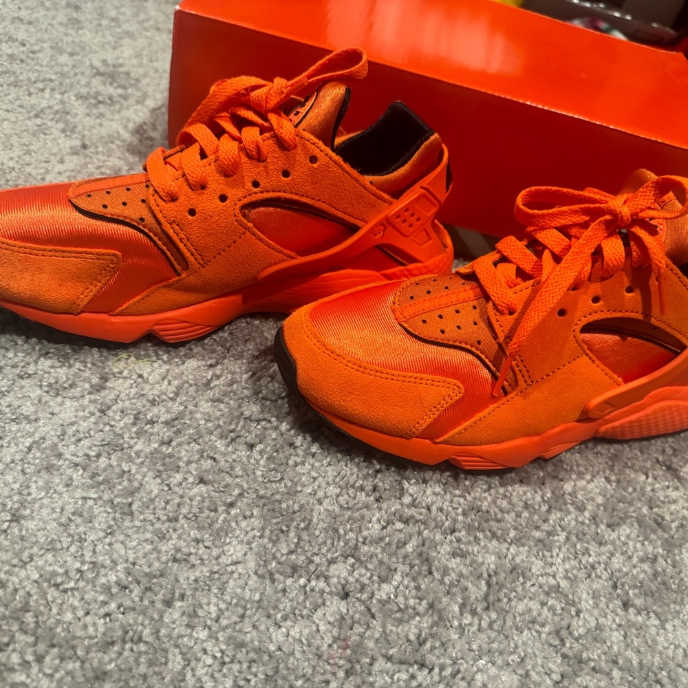Rush orange Nike huaraches
